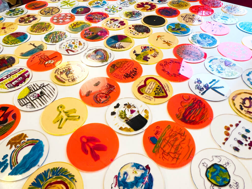 A table full of completed discs